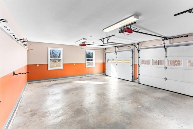 garage featuring a garage door opener