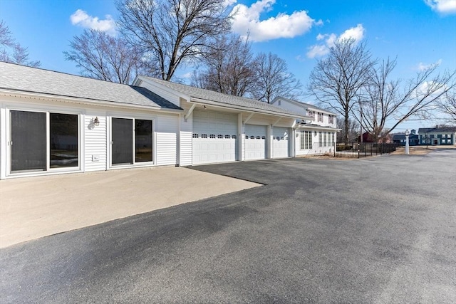 garage featuring driveway