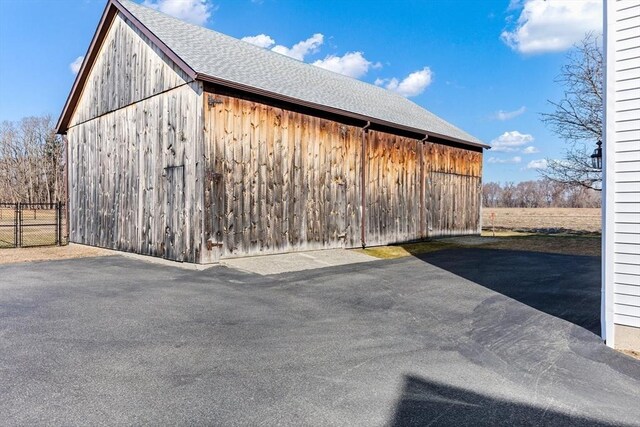 garage with fence