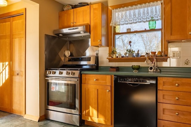 kitchen featuring tasteful backsplash, stainless steel gas range oven, black dishwasher, and light tile patterned flooring