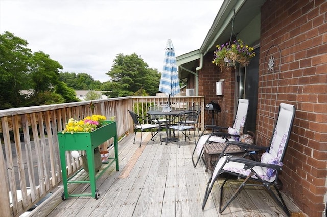 980 Plain St Unit 4, Marshfield, MA 02050 - wooden deck featuring outdoor dining area