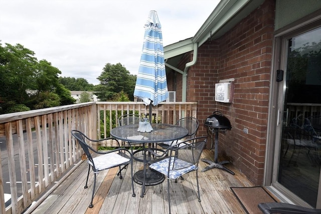980 Plain St Unit 4, Marshfield, MA 02050 - wooden terrace featuring outdoor dining area and a grill