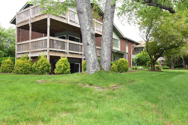 980 Plain St Unit 4, Marshfield, MA 02050 - back of property with a lawn and a wooden deck