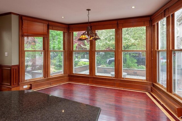 65 Central St, Andover, MA 01810 - unfurnished sunroom with wood finished floors and a wainscoted wall
