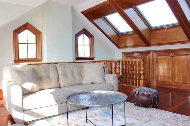 65 Central St, Andover, MA 01810 - living area with a skylight, wood finished floors, and lofted ceiling