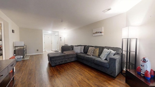 living area featuring dark wood-style floors