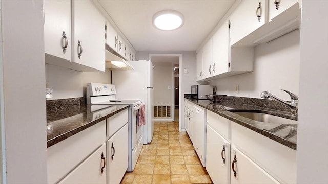kitchen featuring white appliances, a sink, white cabinetry, and under cabinet range hood