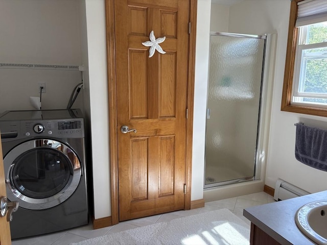 75 Lake St, Rehoboth, MA 02769 - washroom featuring washer / clothes dryer, light tile patterned floors, a baseboard heating unit, and baseboards