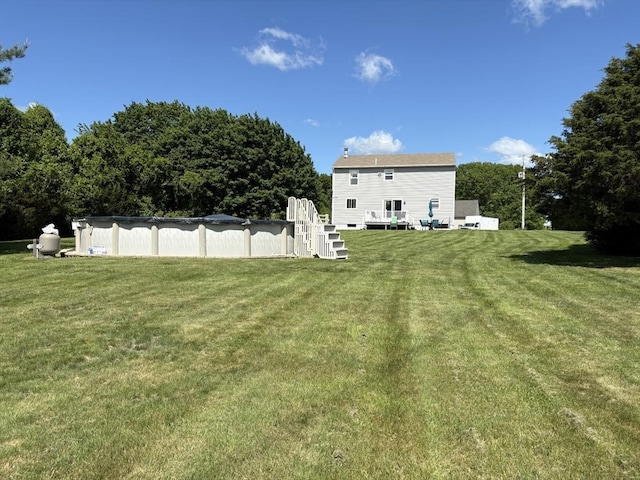 75 Lake St, Rehoboth, MA 02769 - view of grassy yard with a covered pool and a deck
