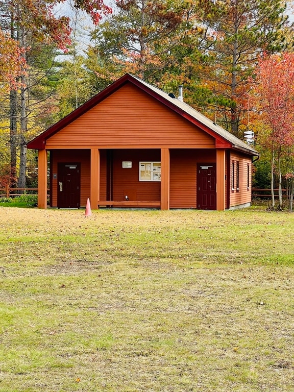 garage with a yard