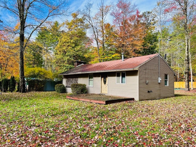 exterior space with a yard