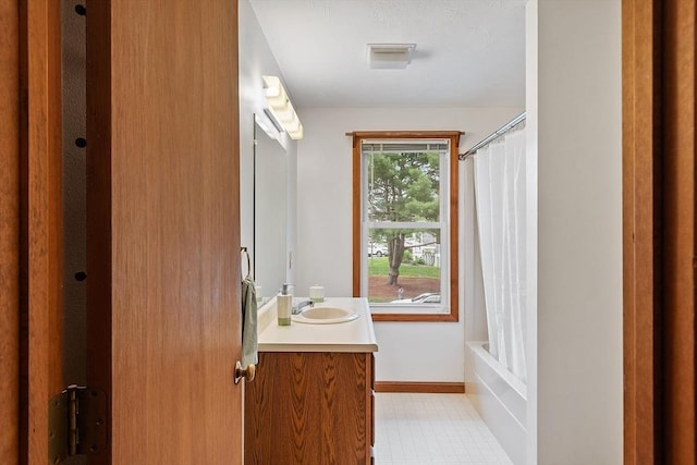 165 Bayberry Hill Ln Unit 165, Leominster, MA 01453 - full bathroom featuring vanity, shower / bath combo, and tile patterned floors