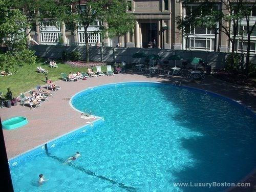 community pool with a patio area