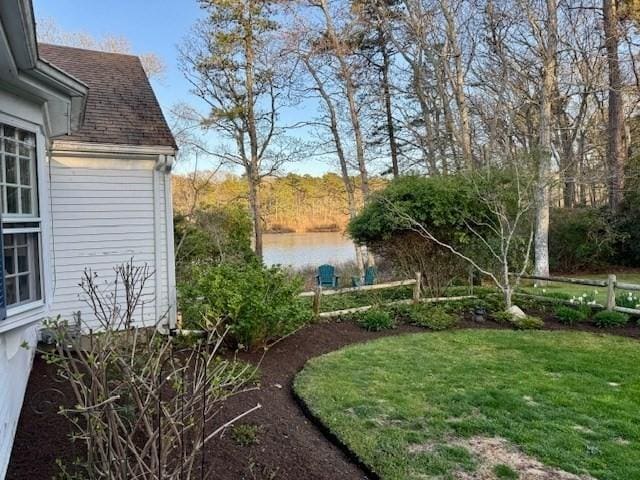 view of yard with a water view