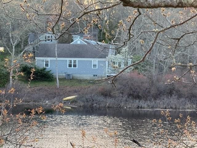 view of side of property featuring a water view