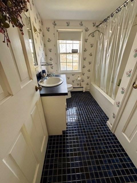 bathroom with vanity, shower / bath combo with shower curtain, toilet, wallpapered walls, and tile patterned floors