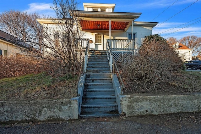 bungalow-style house featuring covered porch