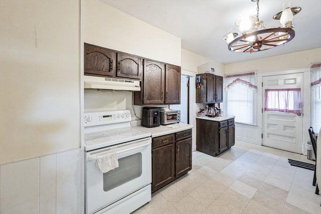 kitchen with pendant lighting, white range with electric stovetop, dark brown cabinets, and an inviting chandelier