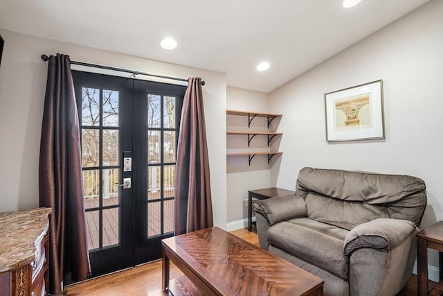 2171 Commonwealth Ave, Newton, MA 02466 - sitting room with french doors, light wood-type flooring, recessed lighting, baseboards, and vaulted ceiling