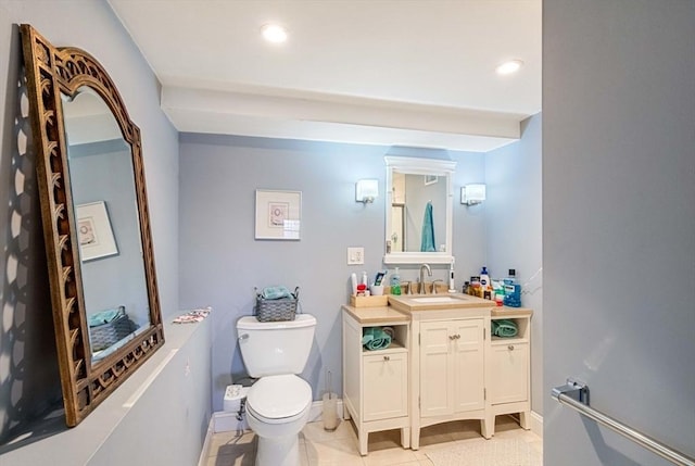 2171 Commonwealth Ave, Newton, MA 02466 - bathroom with toilet, vanity, tile patterned flooring, recessed lighting, and baseboards