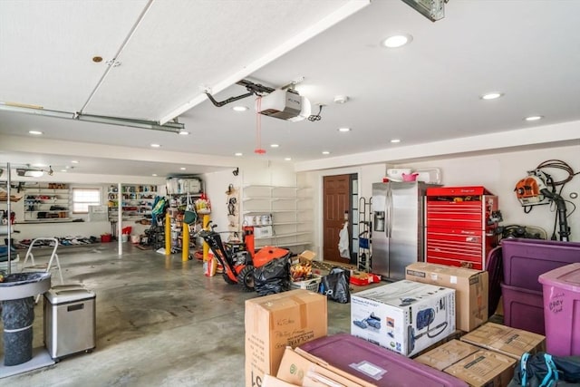 2171 Commonwealth Ave, Newton, MA 02466 - garage with a garage door opener, stainless steel refrigerator with ice dispenser, and recessed lighting