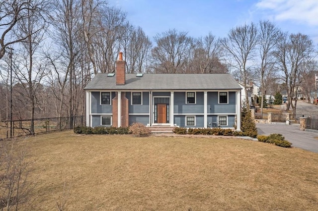 2171 Commonwealth Ave, Newton, MA 02466 - bi-level home featuring a chimney