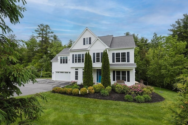 37 Sandy Ridge Rd, Sterling, MA 01564 - view of front of home featuring driveway, an attached garage, a front lawn, and roof with shingles