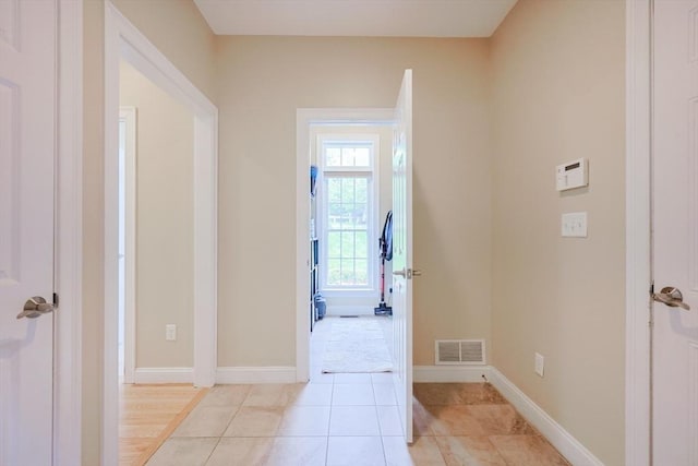 37 Sandy Ridge Rd, Sterling, MA 01564 - corridor with light tile patterned floors and baseboards