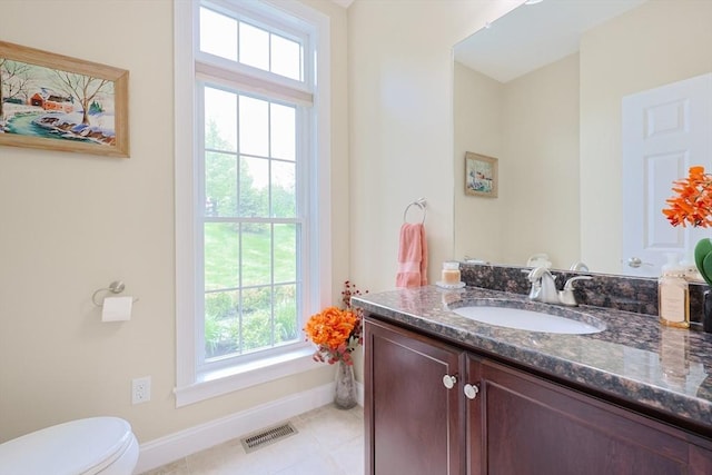 37 Sandy Ridge Rd, Sterling, MA 01564 - half bath with baseboards, vanity, healthy amount of natural light, and toilet