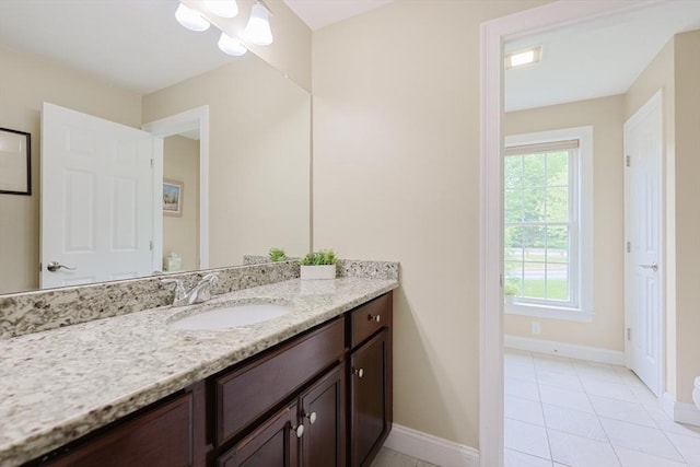 37 Sandy Ridge Rd, Sterling, MA 01564 - bathroom featuring vanity, baseboards, and tile patterned floors