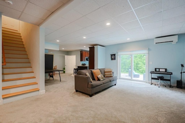 37 Sandy Ridge Rd, Sterling, MA 01564 - living area with light carpet, a wall unit AC, stairs, a paneled ceiling, and recessed lighting