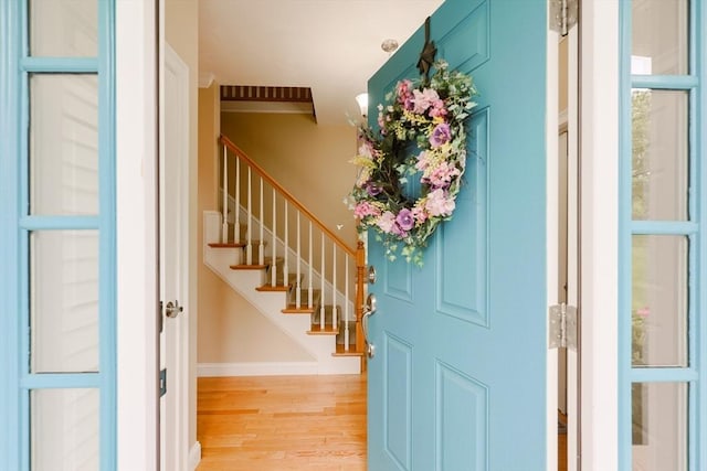 37 Sandy Ridge Rd, Sterling, MA 01564 - foyer entrance with light wood finished floors, stairway, and baseboards