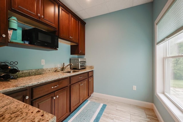 37 Sandy Ridge Rd, Sterling, MA 01564 - kitchen featuring black microwave, baseboards, a sink, plenty of natural light, and a drop ceiling