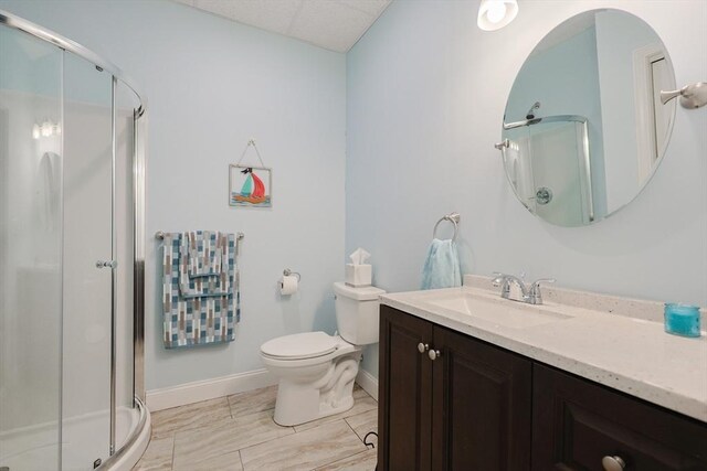 37 Sandy Ridge Rd, Sterling, MA 01564 - full bathroom featuring vanity, baseboards, a shower stall, and toilet