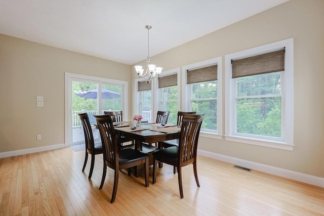 37 Sandy Ridge Rd, Sterling, MA 01564 - dining space featuring baseboards, light wood-style flooring, and a chandelier