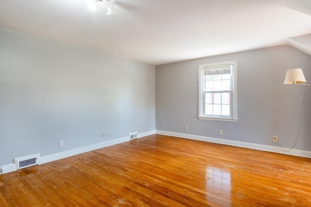40 Fenimore Blvd, Springfield, MA 01108 - spare room with wood-type flooring and baseboards