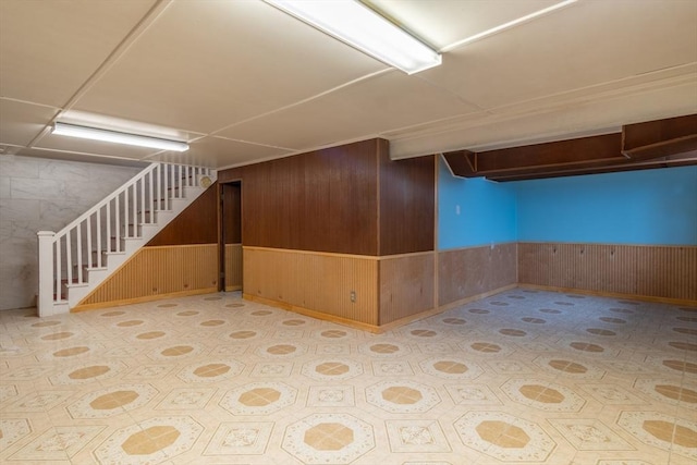 40 Fenimore Blvd, Springfield, MA 01108 - finished basement featuring wood walls, stairway, and a wainscoted wall