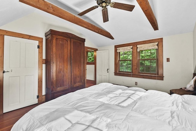 bedroom featuring ceiling fan, lofted ceiling with beams, and dark wood-type flooring