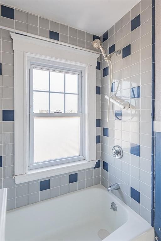 full bathroom with shower / bath combination