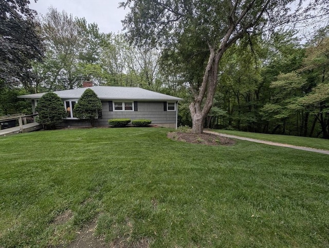 17 Laurel Dr, Millbury, MA 01527 - ranch-style house featuring a chimney and a front yard