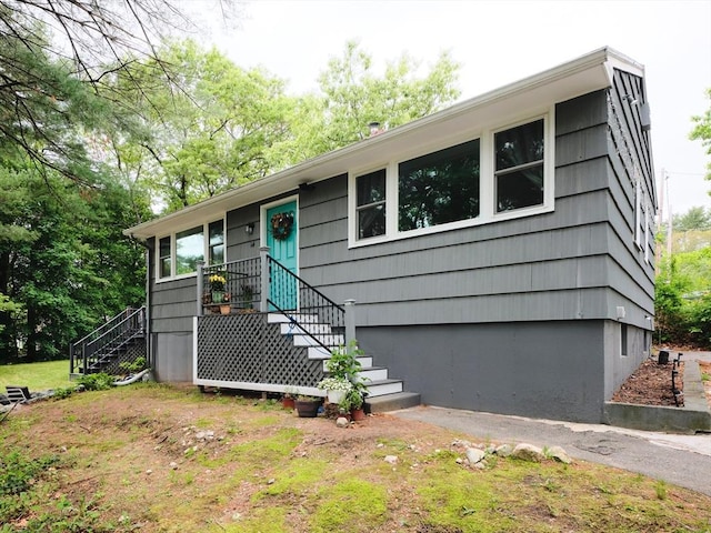 14 Riverside Dr, North Reading, MA 01864 - ranch-style house featuring stairway and an attached garage