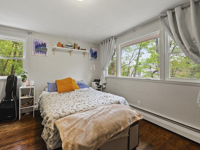 14 Riverside Dr, North Reading, MA 01864 - bedroom featuring a baseboard radiator and dark wood-style flooring