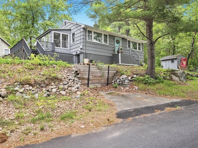 14 Riverside Dr, North Reading, MA 01864 - ranch-style house featuring a sunroom and stairs