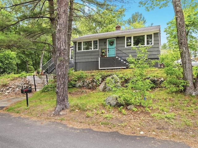 14 Riverside Dr, North Reading, MA 01864 - view of front of house with a chimney