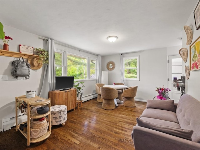14 Riverside Dr, North Reading, MA 01864 - living area with wood finished floors, a baseboard heating unit, and a baseboard radiator