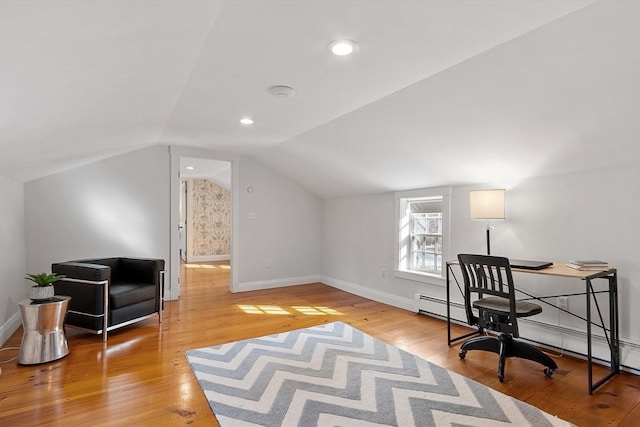 office space featuring baseboards, light wood-type flooring, lofted ceiling, recessed lighting, and a baseboard radiator