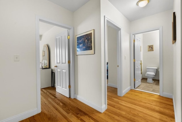 2826 Washington St, Boston, MA 02119 - corridor with light wood-style flooring and baseboards
