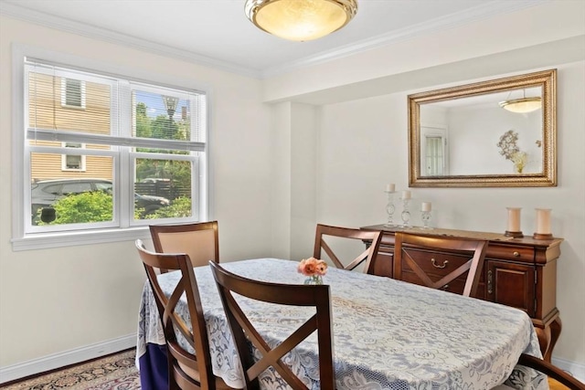 2826 Washington St, Boston, MA 02119 - dining area featuring baseboards, ornamental molding, and wood finished floors