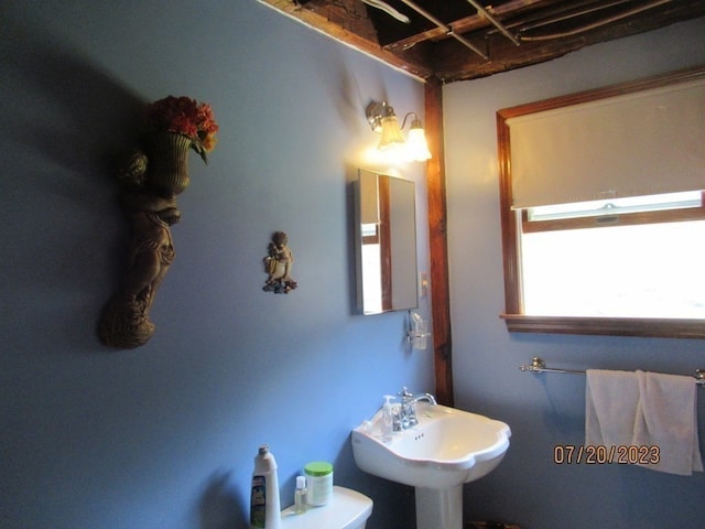 bathroom with sink and toilet