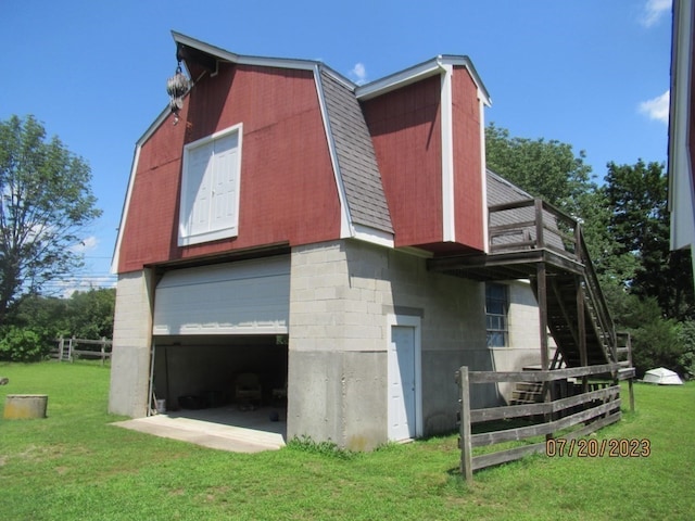 view of property exterior with a yard